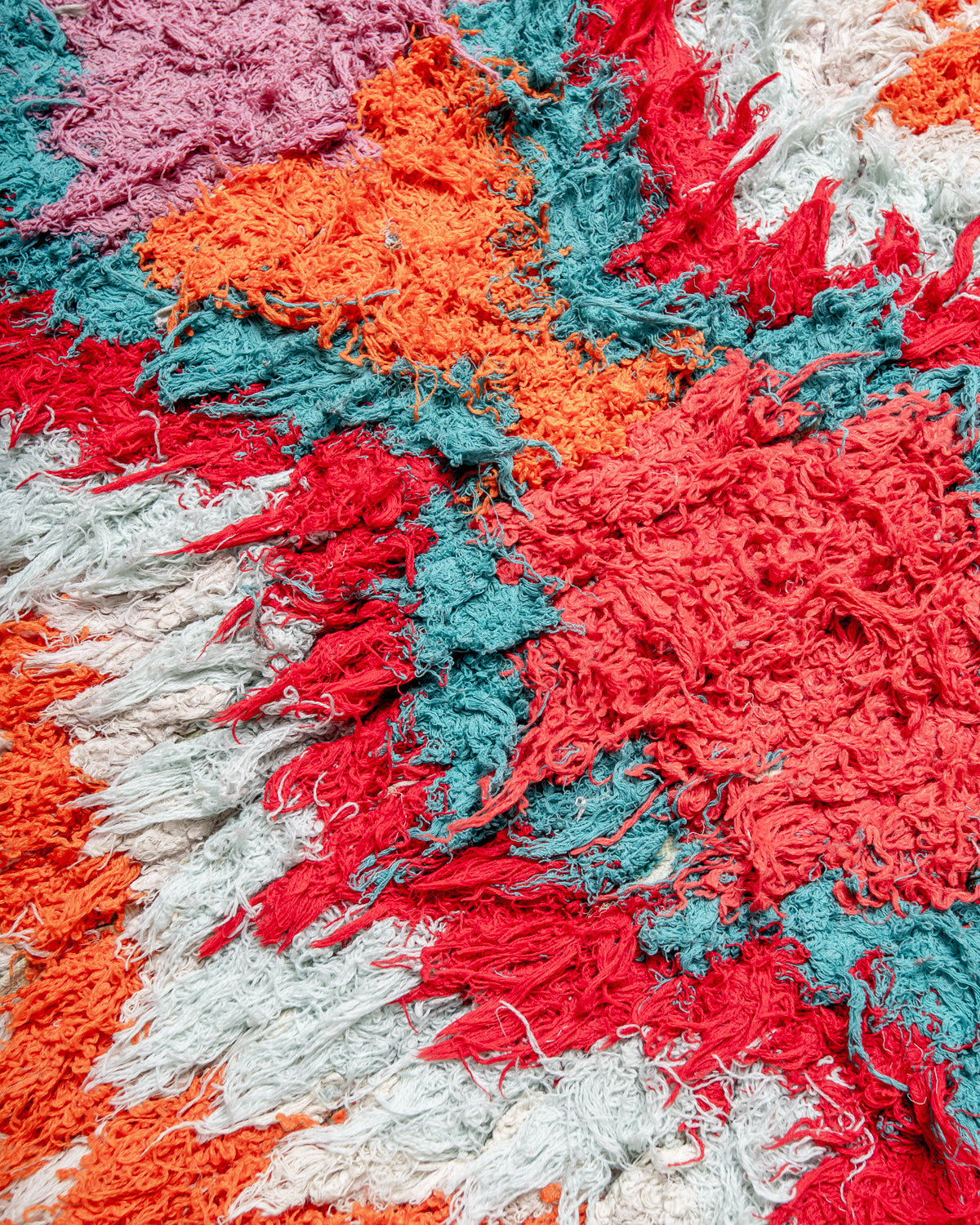 Modern designer vintage handcrafted Berber rug from Morocco. Boucherouite runner rug with beautiful colors and patterns.
